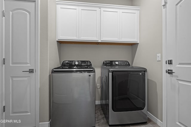 912 Malven Pl, El Paso, TX 79928 - laundry room featuring separate washer and dryer and cabinet space
