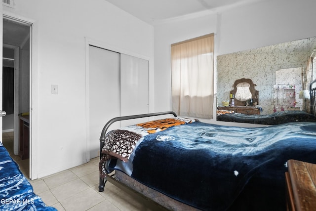 5828 Blackhawk Dr, El Paso, TX 79924 - bedroom featuring tile patterned floors and a closet