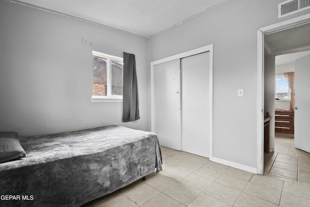 5828 Blackhawk Dr, El Paso, TX 79924 - bedroom with tile patterned floors and a closet