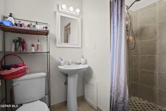 5828 Blackhawk Dr, El Paso, TX 79924 - bathroom featuring a stall shower and tile patterned flooring