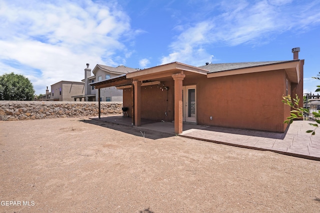 4609 Al Hernandez St, El Paso, TX 79938 - back of house featuring a patio and stucco siding