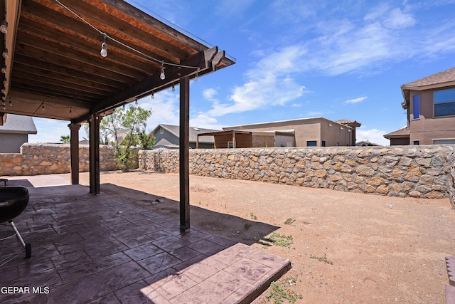 4609 Al Hernandez St, El Paso, TX 79938 - fenced backyard featuring a patio area