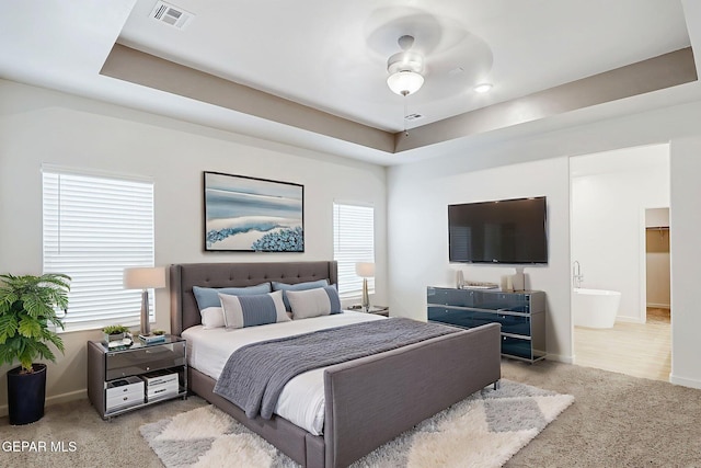 248 Farnborough St, El Paso, TX 79928 - carpeted bedroom featuring baseboards and a tray ceiling