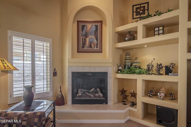 6316 Franklin Red Dr, El Paso, TX 79912 - living area with built in features and a tiled fireplace