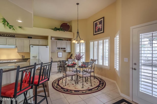 6316 Franklin Red Dr, El Paso, TX 79912 - dining space featuring healthy amount of natural light and light tile patterned floors