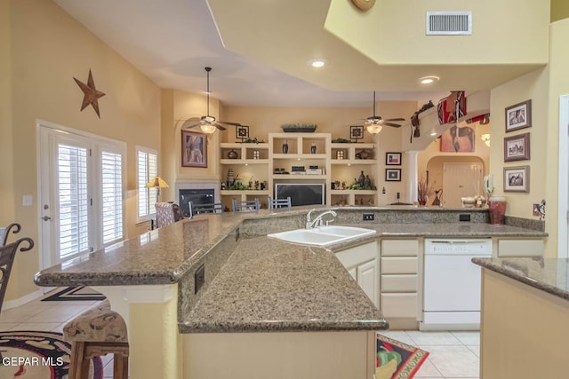 6316 Franklin Red Dr, El Paso, TX 79912 - kitchen with dishwasher, ceiling fan, light tile patterned floors, open floor plan, and recessed lighting