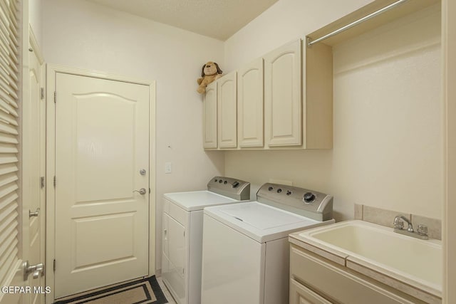 6316 Franklin Red Dr, El Paso, TX 79912 - washroom with cabinet space and separate washer and dryer