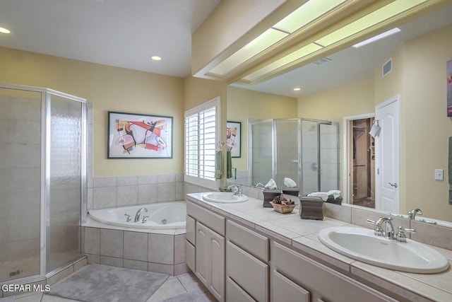 6316 Franklin Red Dr, El Paso, TX 79912 - full bathroom with a stall shower, double vanity, a tub with jets, tile patterned floors, and recessed lighting