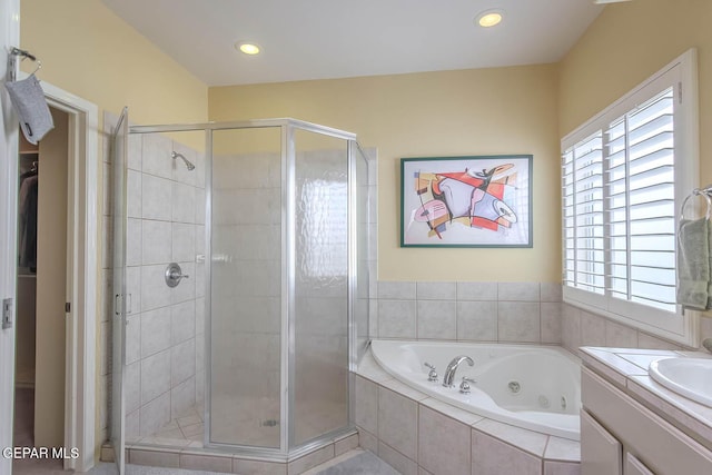 6316 Franklin Red Dr, El Paso, TX 79912 - full bathroom with a stall shower, a jetted tub, vanity, and recessed lighting