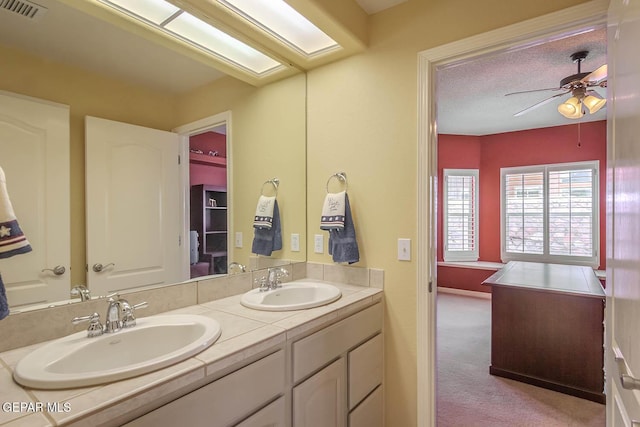 6316 Franklin Red Dr, El Paso, TX 79912 - bathroom with double vanity and ceiling fan