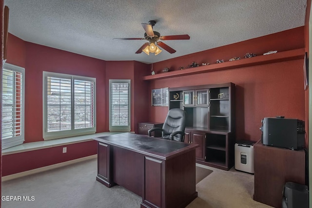 6316 Franklin Red Dr, El Paso, TX 79912 - office featuring a ceiling fan, light carpet, and a textured ceiling