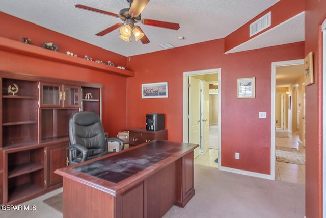 6316 Franklin Red Dr, El Paso, TX 79912 - office area with a ceiling fan, a textured ceiling, light tile patterned floors, and light carpet