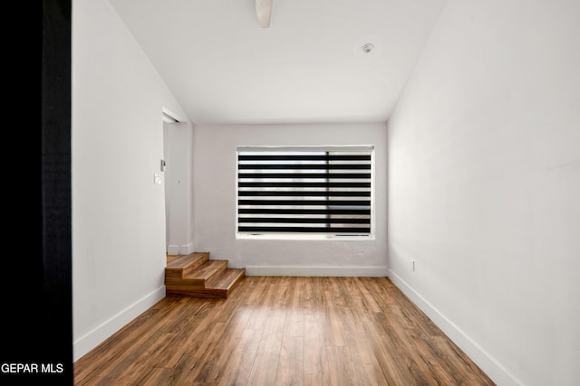 721 Mesita Dr, El Paso, TX 79902 - spare room featuring wood finished floors and baseboards