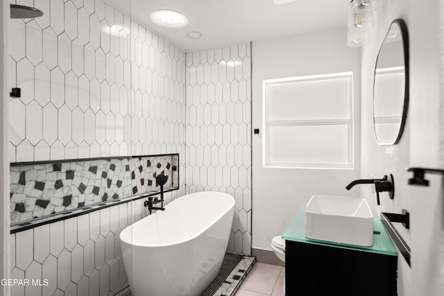 721 Mesita Dr, El Paso, TX 79902 - bathroom with a freestanding bath, tile patterned flooring, and double vanity