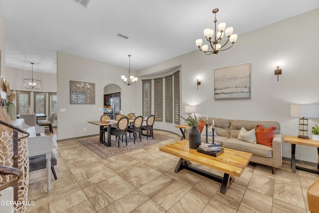 7817 Enchanted Trail Dr, El Paso, TX 79911 - living area featuring a chandelier and baseboards