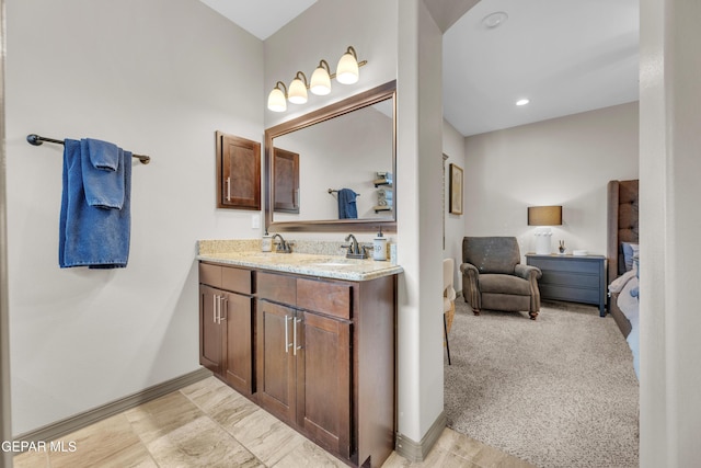 7817 Enchanted Trail Dr, El Paso, TX 79911 - full bathroom with double vanity, connected bathroom, and recessed lighting