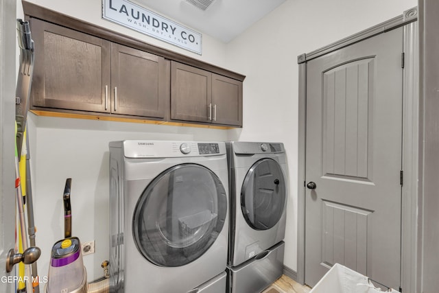 7817 Enchanted Trail Dr, El Paso, TX 79911 - laundry room with cabinet space and washing machine and clothes dryer