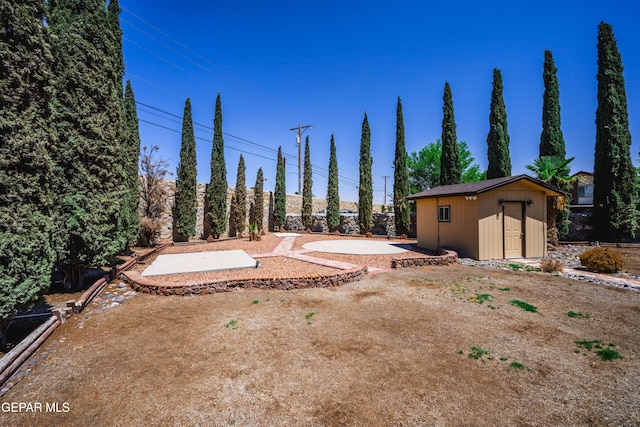 11713 Queens Garden Cir, El Paso, TX 79936 - view of yard with a patio and a shed