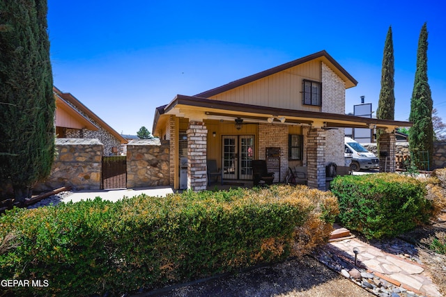 11713 Queens Garden Cir, El Paso, TX 79936 - view of front of property featuring french doors, brick siding, and a porch