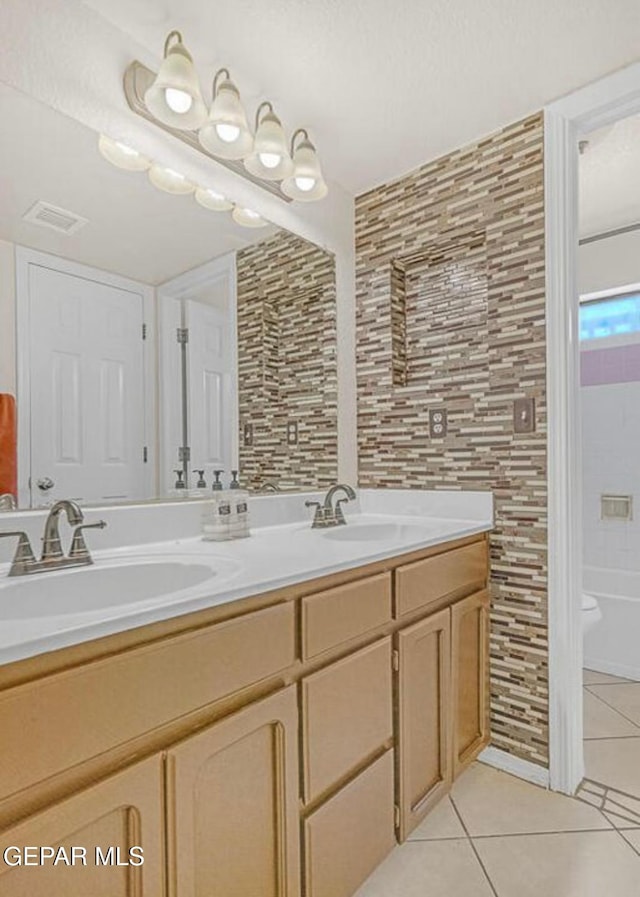 11713 Queens Garden Cir, El Paso, TX 79936 - bathroom featuring double vanity and tile patterned flooring