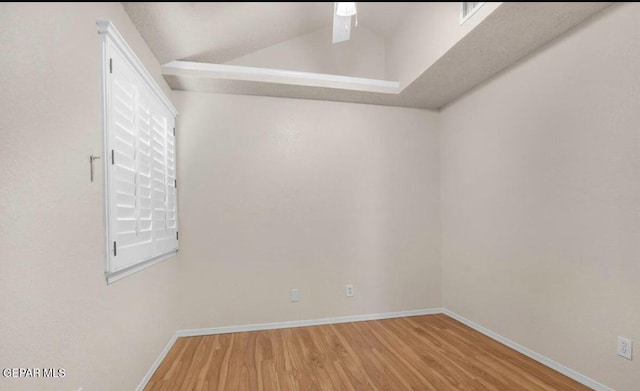 11713 Queens Garden Cir, El Paso, TX 79936 - spare room featuring wood finished floors and lofted ceiling