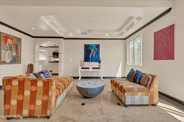4540 N Stanton St, El Paso, TX 79902 - living area featuring a tray ceiling, arched walkways, ornamental molding, and recessed lighting
