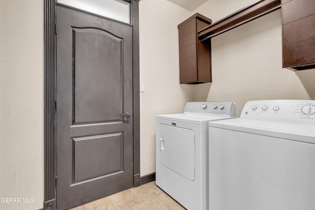 4540 N Stanton St, El Paso, TX 79902 - laundry room with cabinet space and washer and dryer