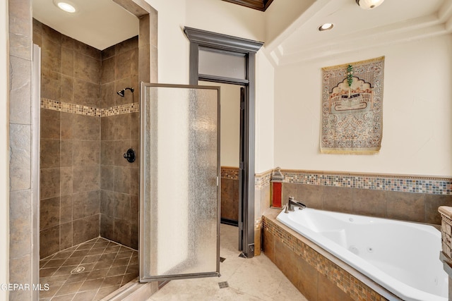 4540 N Stanton St, El Paso, TX 79902 - bathroom with a shower stall, a whirlpool tub, recessed lighting, and tile patterned flooring