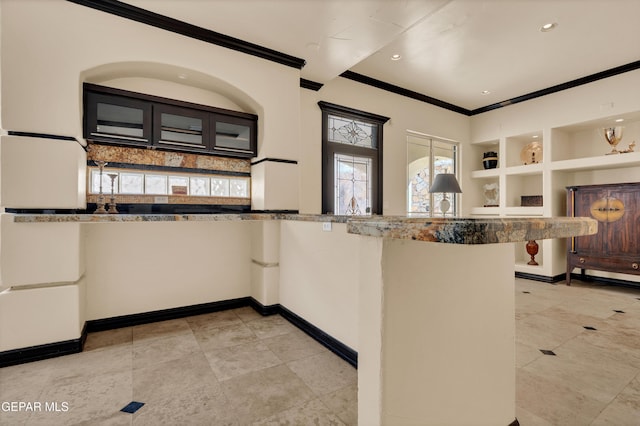 4540 N Stanton St, El Paso, TX 79902 - kitchen featuring ornamental molding, built in features, recessed lighting, and light tile patterned flooring