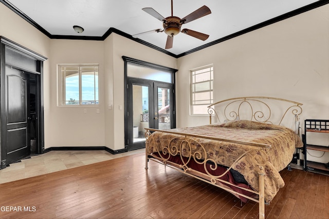 4540 N Stanton St, El Paso, TX 79902 - bedroom with access to exterior, ornamental molding, light wood-style floors, and ceiling fan