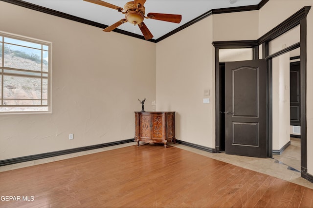 4540 N Stanton St, El Paso, TX 79902 - empty room featuring ornamental molding, ceiling fan, and light wood-style flooring