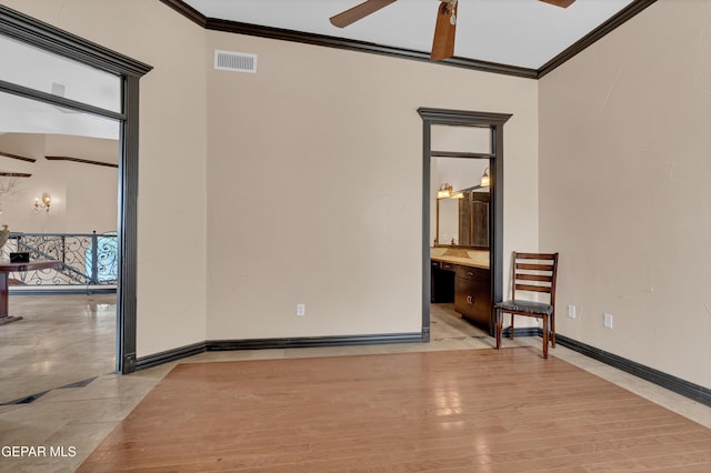 4540 N Stanton St, El Paso, TX 79902 - empty room featuring a ceiling fan and ornamental molding