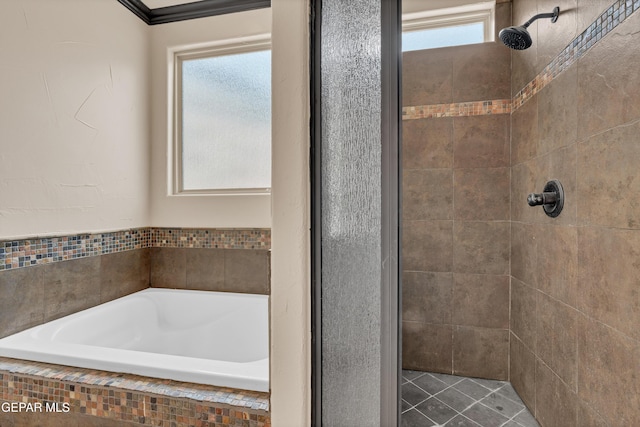 4540 N Stanton St, El Paso, TX 79902 - bathroom with tiled shower and a garden tub