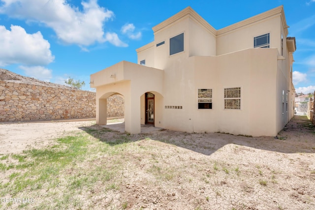 4540 N Stanton St, El Paso, TX 79902 - view of front of property with stucco siding and a patio
