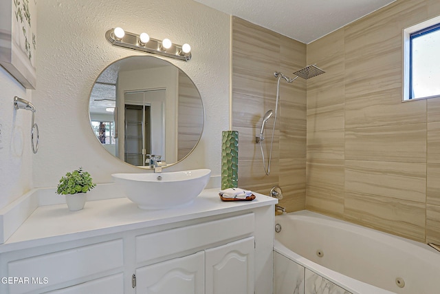 10304 Thor St, El Paso, TX 79924 - bathroom with vanity and a combined bath / shower with jetted tub