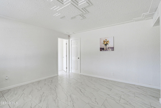 10304 Thor St, El Paso, TX 79924 - empty room featuring light marble finish floors and a textured ceiling