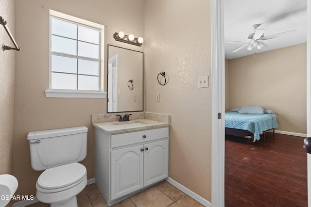 2072 Pueblo Nuevo Cir, El Paso, TX 79936 - bathroom with vanity, ceiling fan, and connected bathroom