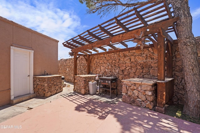 2072 Pueblo Nuevo Cir, El Paso, TX 79936 - view of patio featuring a pergola and a sink