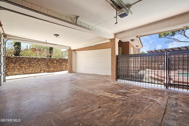 2072 Pueblo Nuevo Cir, El Paso, TX 79936 - garage with a garage door opener and concrete driveway
