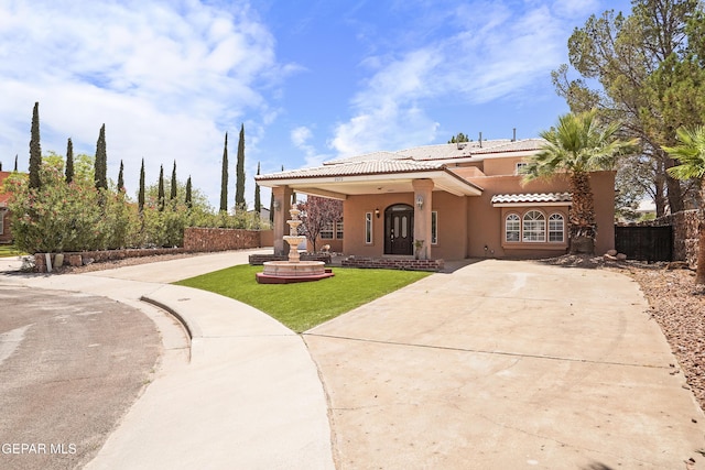 2072 Pueblo Nuevo Cir, El Paso, TX 79936 - view of front of property featuring driveway, stucco siding, and a tiled roof