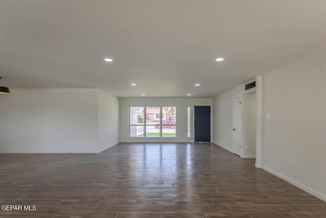 1605 Larry Wadkins Dr, El Paso, TX 79936 - empty room with dark wood-style floors and recessed lighting