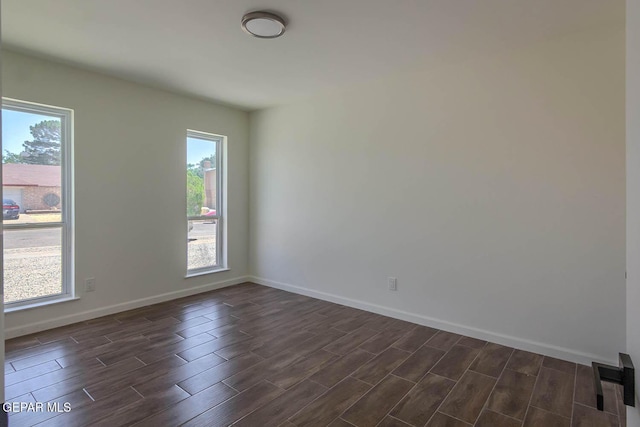 1605 Larry Wadkins Dr, El Paso, TX 79936 - empty room with wood finish floors and baseboards