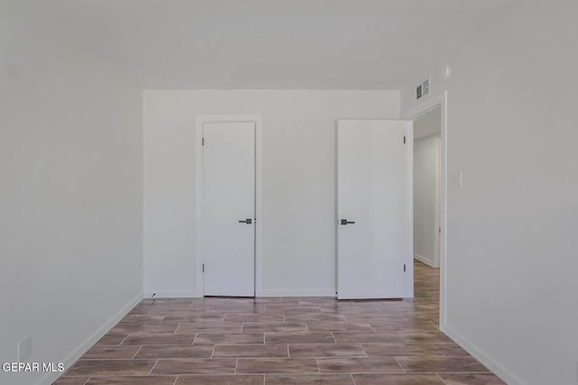 1605 Larry Wadkins Dr, El Paso, TX 79936 - spare room featuring wood tiled floors