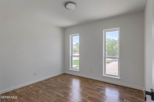 1605 Larry Wadkins Dr, El Paso, TX 79936 - spare room featuring wood finish floors