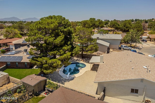 1605 Larry Wadkins Dr, El Paso, TX 79936 - aerial view of residential area with mountains and a pool area