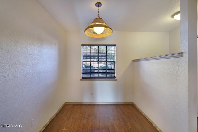 417 Irondale Dr Unit M, El Paso, TX 79912 - unfurnished room with wood finished floors and baseboards