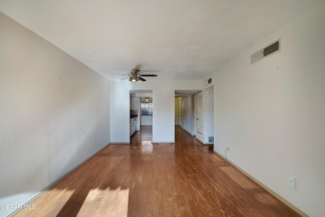417 Irondale Dr Unit M, El Paso, TX 79912 - unfurnished living room featuring ceiling fan and wood finished floors