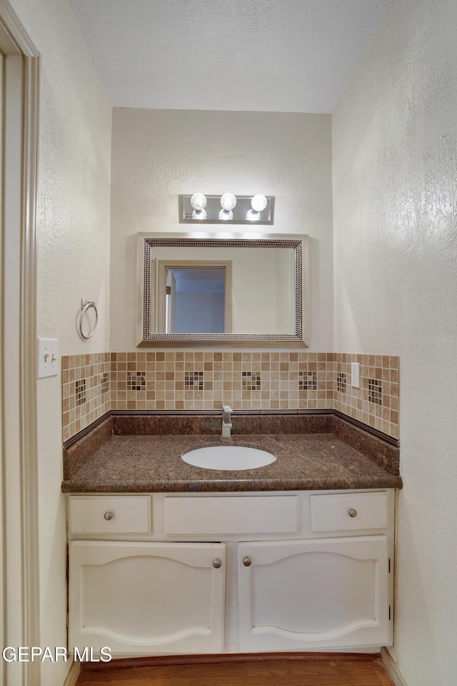 417 Irondale Dr Unit M, El Paso, TX 79912 - bathroom with vanity and backsplash