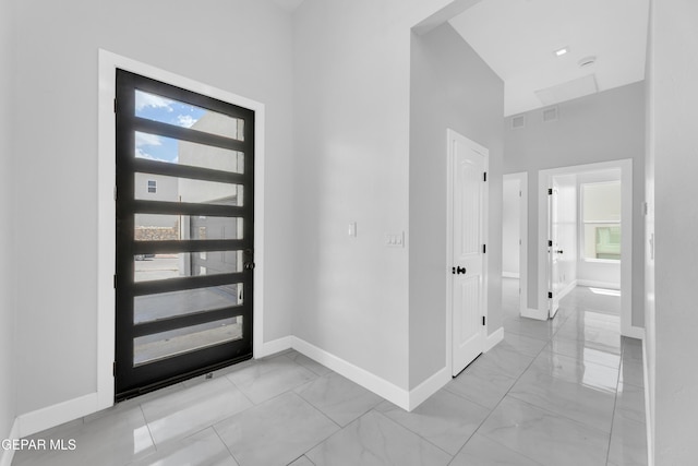 7549 Enchanted Park Dr 706849, El Paso, TX 79911 - entrance foyer with a high ceiling and light marble finish floors