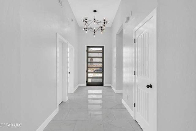 7549 Enchanted Park Dr 706849, El Paso, TX 79911 - entryway featuring a chandelier, light marble finish floors, and a high ceiling